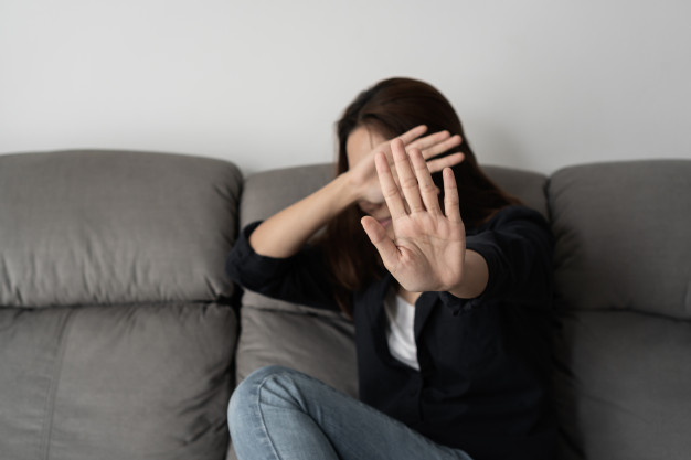 woman covering her face fear domestic violence concept violence abuse 164138 49