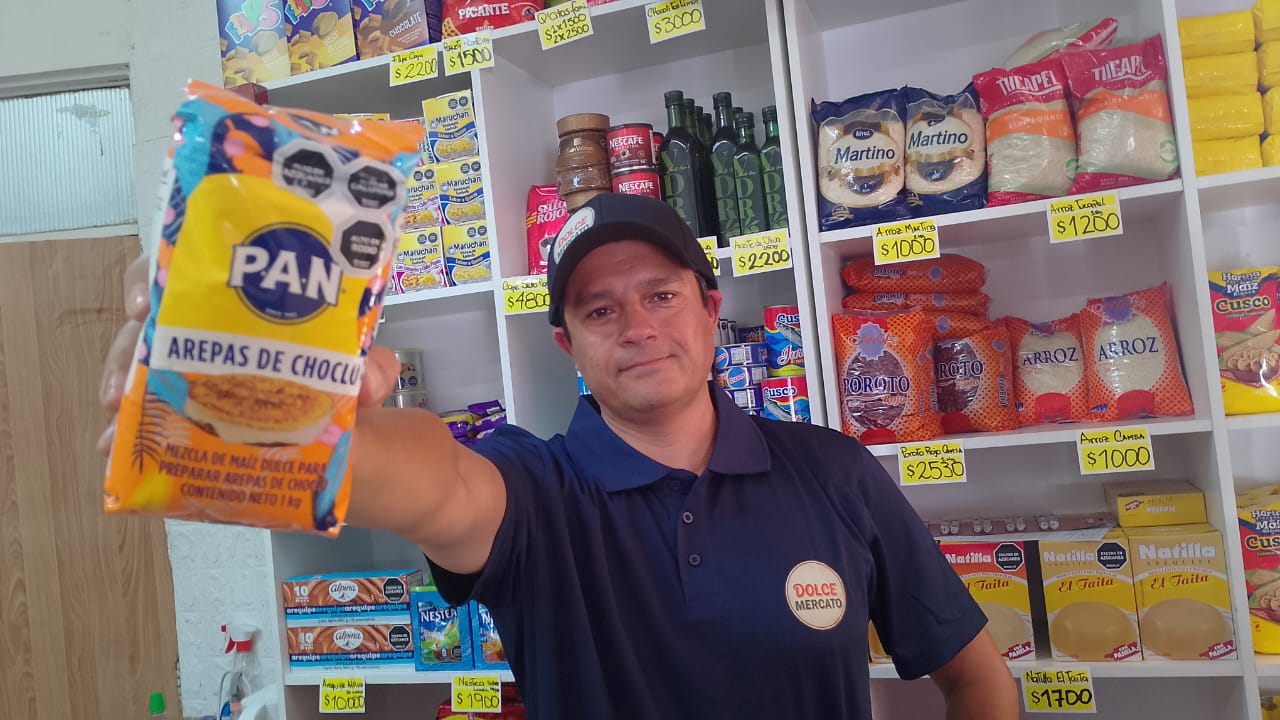 Dulce marcato caballero y oan de arepas mejor persectiva